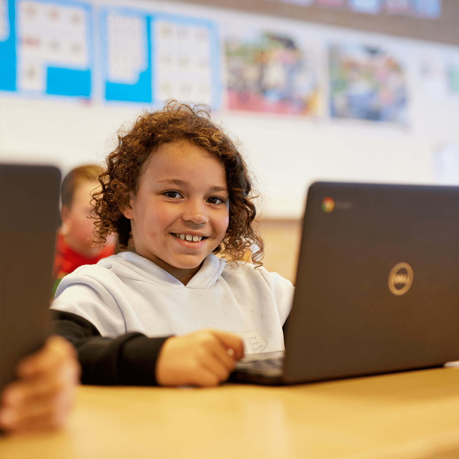 kid working on laptop